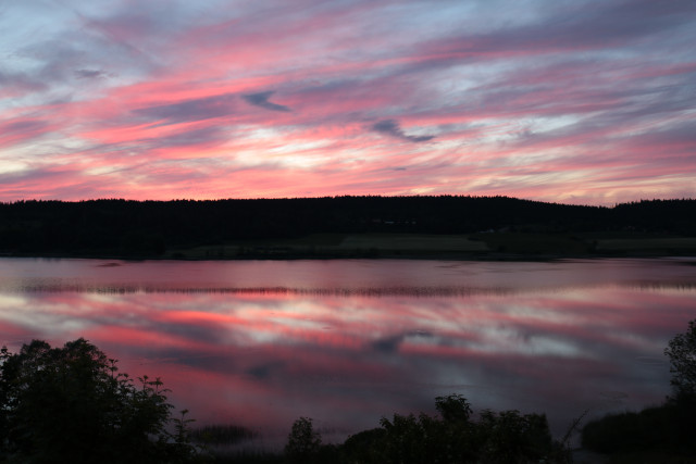coucher de soleil depuis le balcon sur le lac