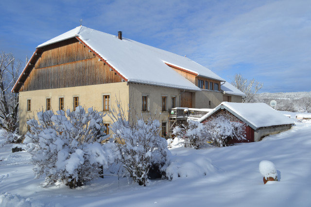 maison sous la neige